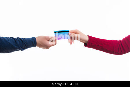 Closeup shot of a man passing a payment credit card to the  seller. Sale and payment concept. Stock Photo