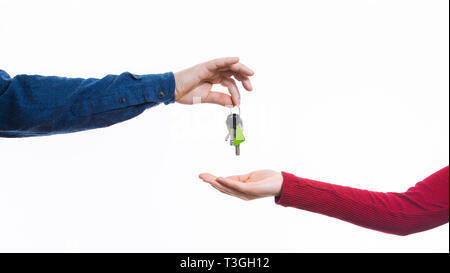 Real estate agent realtor hands give keys to female client.Loan mortgage buying selling property new home apartments concept. Stock Photo