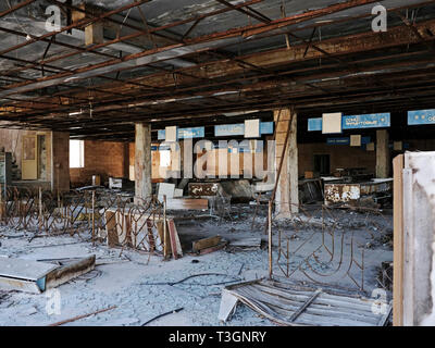 Abandoned supermarket in the ghost town of Pripyat inside the exclusion zone of Chernobyl, Ukraine, April 2019 Stock Photo