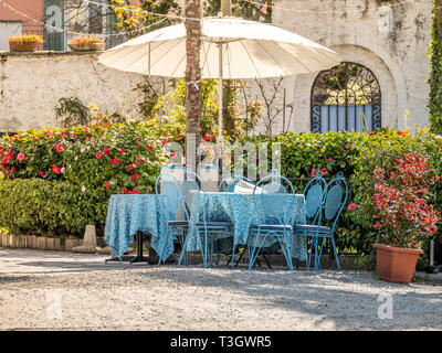 Image of decorated blue restaurant table on a terrace Stock Photo