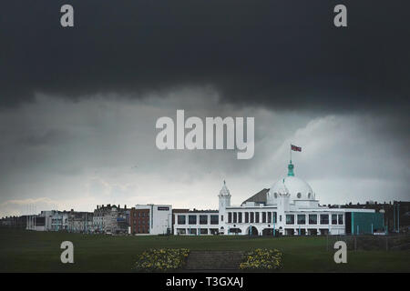 Storm clouds over the dome at Spanish City in Whitley Bay, Northumberland, after temperatures dipped below freezing overnight. Stock Photo