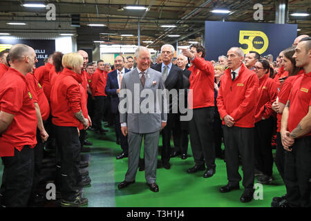 The Prince of Wales meets workers during his visit to Pirelli Tyres Ltd in Carlisle to celebrate their 50th anniversary while on a tour of Cumbria. Stock Photo