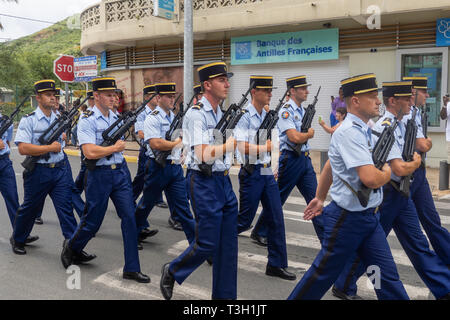Marigot, Saint-Martin, France - July 14, 2013: French police officers taking part in the parade on the 14th of july, the french national holiday in Ma Stock Photo