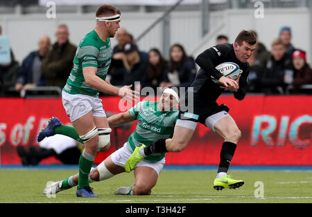 Saracens' Ben Spencer is tackled by Newcastle Falcons' Josh Matavesi during the Gallagher Premiership match at Allianz Park, London. Stock Photo