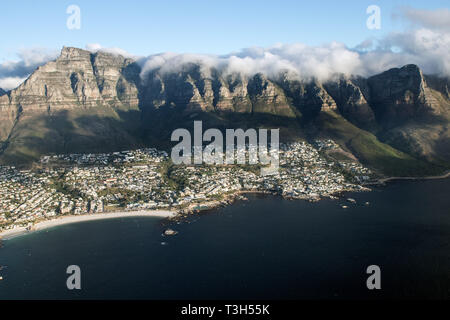 Twelve apostoles form the back of table mountain in Cape Town over camps bay in South Africa Stock Photo