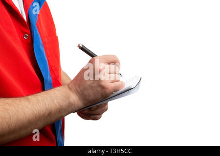 Closeup of hypermarket or supermarket male employee writing in notebook by using pen isolated on white background Stock Photo