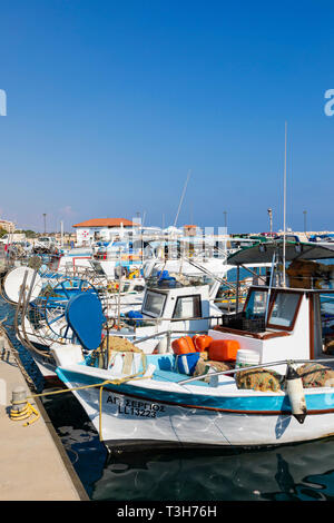 Traditional Cypriot fishing boats moored in Zygi Harbour, Cyprus October 2018 Stock Photo