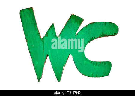Wooden WC toilet sign letters painted in green isolated on white background Stock Photo