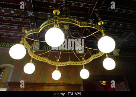 Close-up of a gothic style brass chandelier - John Gollop Stock Photo