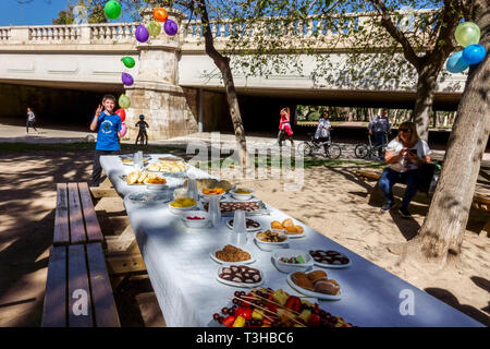 Picnic and children's birthday party in Turia gardens Valencia Spain Europe Stock Photo