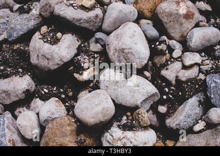 Mud and stones in a pile Stock Photo