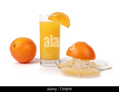 fresh squeezed orange juice - glass with fresh squeezed orange juice and oranges isolated on white Stock Photo