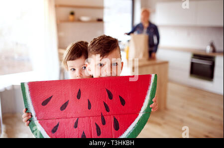Two happy children playing at home. Copy space. Stock Photo
