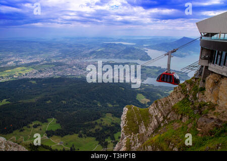 Aerial view from Mount Pilatusen Switzerland over the cliffs and lakes of Lucerne and view of the cable-stayed cableway to Mount Pilatus Stock Photo