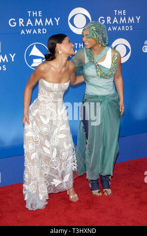 LOS ANGELES, CA. February 27, 2002: Singers NELLY FURTADO (left) & ALICIA KEYES at the 2002 Grammy Awards in Los Angeles. Stock Photo