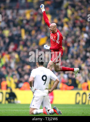 Watford goalkeeper Heurelho Gomes celebrates victory after the FA Cup semi final match at Wembley Stadium, London. Stock Photo