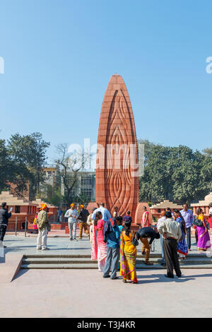 Flame monument at Jallianwala Bagh, a public garden in Amritsar, Punjab, India, a memorial commemorating the 1919 British Jallianwala Bagh Massacre shooting Stock Photo