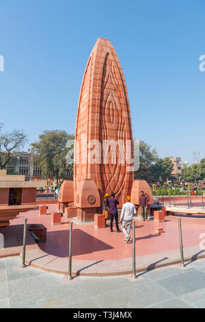 Flame monument at Jallianwala Bagh, a public garden in Amritsar, Punjab, India, a memorial commemorating the 1919 British Jallianwala Bagh Massacre shooting Stock Photo
