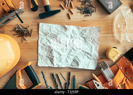Handyman professional DIY project workplace tabletop with various tools and mock up copy space Stock Photo