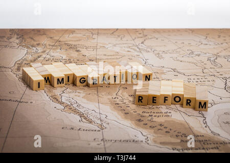 Immigration Reform concept on US-Mexico border map with United States and Mexico flags Stock Photo