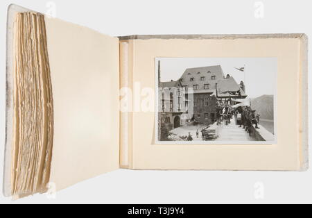 Rudolf Heß, a large photo file and three photo memory albums HJ Photo file with 45 pictures (13.4 x 20.8 cm) of a large HJ tent camp, ca. 1935/36, visited by Adolf Hitler, Baldur von Schirach, Rudolf Heß, Joseph Goebbels and foreign delegates. Photo album no. 1 commemorating the visit of Stahleck Castle near Bacharach on the Rhine on 12th April 1937, 26 pictures, dedication, and signature of the state director of the HJ federation. Photo album no. 2 with pictures of Heß' visit to the Rhine Youth Hostel Association in Düsseldorf, 23 photos, dedication and signature of the Ha, Editorial-Use-Only Stock Photo