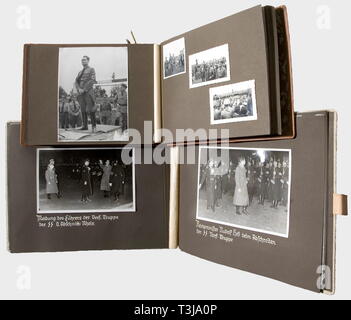 Rudolf Heß, four photo albums Trier, Stuttgart, Württemberg, Schwindegg Memory album of Heß' trip to Trier and Saarburg on 19th March 1936, 25 well-preserved large-size photos, memory album of his trip to Stuttgart during the campaign 1936, 38 photos of various sizes documenting his reception at the airport, his passing the guard of honour, car ride through the City of Stuttgart, rally in the town hall. Photo album commemorating his meeting with political leaders of the Gau Württemberg/Hohenzollern in the Fürth tent camp on the occasion of the Reich Party Congress 1934, 50 , Editorial-Use-Only Stock Photo