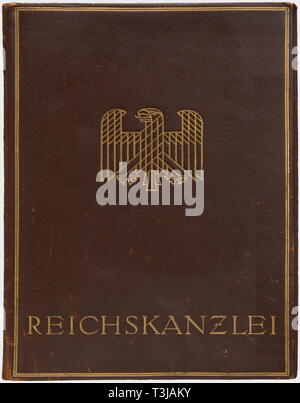 Adolf Hitler, a Reich's Chancellery document folder Dark brown leather with a gold-stamped national eagle still without the swastika and the inscription 'Reichskanzlei'. Dimensions 36 x 25 cm. Inside there are two double pages 'Der Führer' with a stamped and printed party eagle, and two double pages with the heading printed in raised gold letters 'Adolf Hitler - München, den' along with two envelopes for letters. Early case from the Reich's Chancellery cabinet chamber in the first year of Hitler's reign. Provenance: Keith Wilson Collection, Kansas City. historic, historical, Editorial-Use-Only Stock Photo