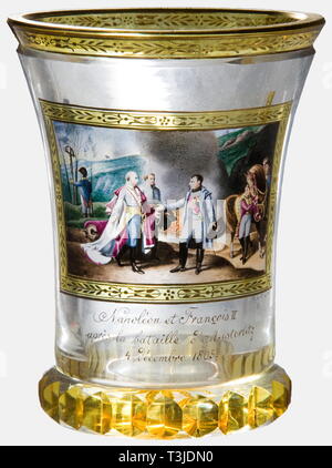 Napoleon and Francois II after the Battle of Austerlitz, a Viennese glass beaker, Fürchtegott Leberecht Fischer, circa 1900 Crystal glass flashed with yellow coloured glass in places and golden decoration. The front bears a transparent enamel painting showing the meeting between Napoleon and the Austrian Emperor Franz II on 4 December 1805 at Nasiedlowitz, signed, 'F.L.F. pinx' at the lower left above the title and date, '4 décembre 1805.' A circular lens ground on the back, and a protuding serrated 'cogwheel' base ring as well as a star ground i, Additional-Rights-Clearance-Info-Not-Available Stock Photo