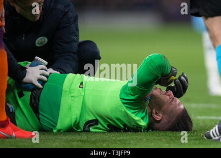 London, UK. 09th Apr, 2019. Goalkeeper Ederson of Man City receives treatment after going down injured during the UEFA Champions League 1st leg match between Tottenham Hotspur and Manchester City at Tottenham Hotspur Stadium, London, England on 9 April 2019. Photo by Andy Rowland. Credit: PRiME Media Images/Alamy Live News Stock Photo