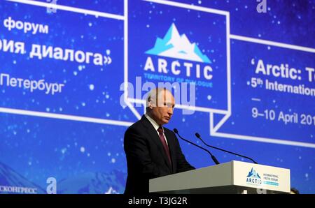 Russian President Vladimir Putin addresses delegates during the plenary session at the 5th International Arctic Forum April 9, 2019 in St Petersburg, Russia.