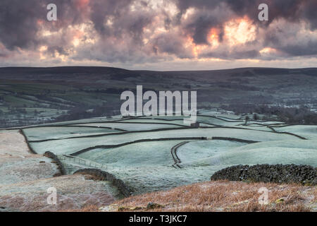 Teesdale, County Durham UK. Wednesday 10th April. UK Weather. It was a cold and frosty start to the day in Teesdale and as the sun began to rise spectacular crepuscular rays began to rake across the landscape. Credit: David Forster/Alamy Live News Stock Photo