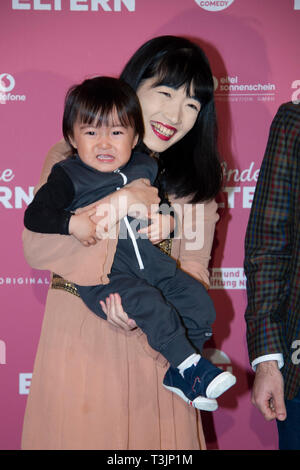 Moeko SUNAYA, actress, with toddler, name unidentified, portrait, portrait, photograph, single image, red carpet, red carpet show, arrival, arrival, 'Other Parents' premiere on 14th March 2019 at Residenz-Kino in Koeln , | usage worldwide Stock Photo