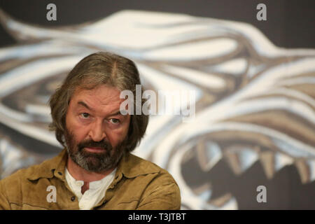 Belfast, UK. 10th Apr 2019. Ian Beattie, Northern Irish actor from Game of Thrones speaks to the media at the launch of Game Of Thrones Touring Exhibition in Belfast, Wednesday 10 April, 2019.The highly-anticipated exhibition will be open to the public from April 11th to the 1st of September 2019. Visitors can explore the settings and view authentic artefacts from a number of scenes. Credit: Paul McErlane/Alamy Live News Stock Photo