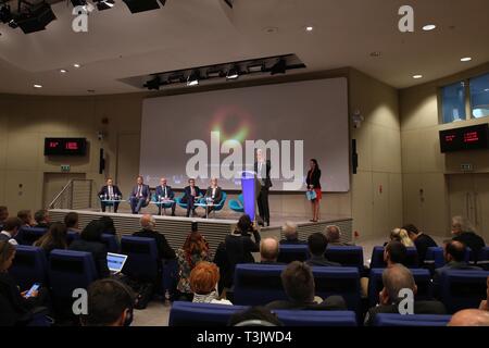 Brussels, Belgium. 10th Apr, 2019. Photo taken on April 10, 2019 shows a press conference unveiling the first image of a black hole in Brussels, capital of Belgium. Astronomers said here Wednesday that they captured the first image of a black hole, unveiling the first direct visual evidence of an unseeable cosmic object and its shadow. Credit: Zhang Cheng/Xinhua/Alamy Live News Stock Photo