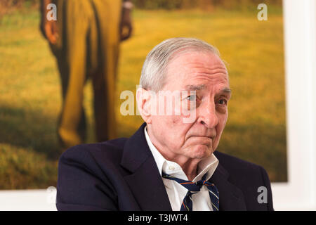 London, UK.  10 April 2019.  American photographer William Eggleston poses in front of one of his works from his new exhibition '2¼' at the David Zwirner gallery in Mayfair.  The show comprises a series of square-format colour photographs taken around 1977 throughout California and the American South and will run April 12 to June 1, 2019.  Credit: Stephen Chung / Alamy Live News Stock Photo