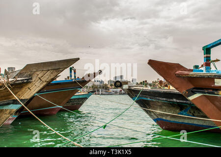 Dhow Cruise Dubai Creek side Traditional Abra ferry boats on the Bay Old Dubai Transportation Stock Photo
