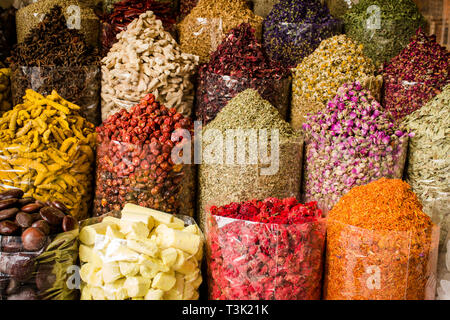 Colorful Spices in spice souk Dubai, all dried herbs nuts and flower spices collections Stock Photo