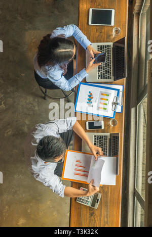 Top view of business people working in the office Stock Photo