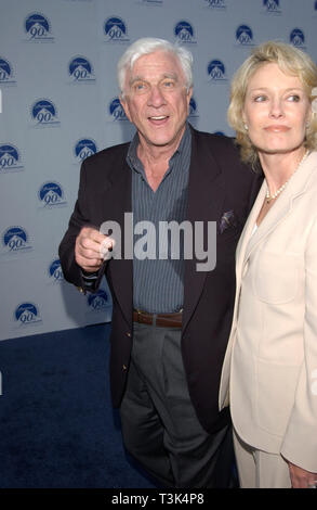 LOS ANGELES, CA. July 14, 2002: Actor LESLIE NIELSEN & date at the Paramount Pictures 90th Anniversary Gala at Paramount Studios, Hollywood. © Paul Smith / Featureflash Stock Photo