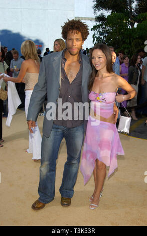 LOS ANGELES, CA. July 22, 2002: Actor GARY DOURDAN & girlfriend at the Hollywood premiere of Austin Powers in Goldmember. © Paul Smith / Featureflash Stock Photo