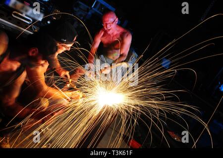 When welding in the workshop Stock Photo