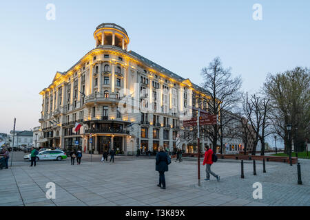 Warsaw, Poland. April 6, 2019.  A view of  Cafe Bristol building in Krakowskie Przedmieście street at sunset Stock Photo