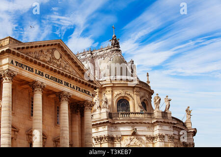 Close-up shot of the Palace of Versailles with the Royal Chapel against blue sky, France Stock Photo