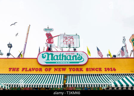 New York City, USA - July 30, 2018: Restaurant called Nathans at the Luna Park amusement park in the promenade of Coney Island Beach, Brooklyn, New Yo Stock Photo