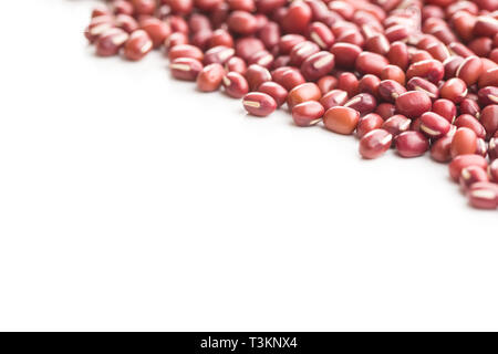 Red adzuki beans isolated on white background. Stock Photo