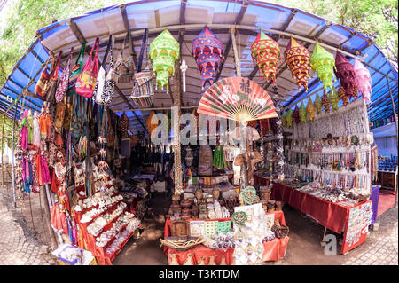 Mattancherry beach,Curio Shop,display of sea shells,chinesr lanterns,woodensmall,artifacts,Kerala dress,sari,serving,visitors,tourists,Kochi, Kerala,I Stock Photo