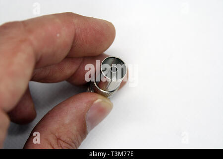 Coaxial cable jack. Antenna cable jack. Coaxial cable extension jack. Metal made cable jack. Stock Photo