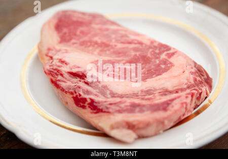 Premium quality kobe beef ribeye steak in plate, close-up Stock Photo