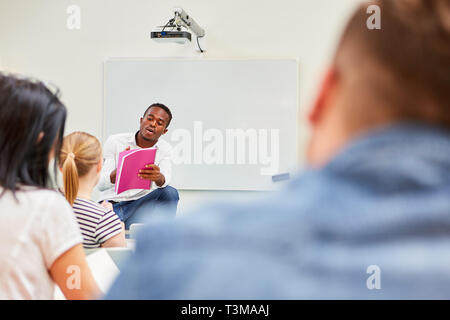 African student as a speaker in the seminar or course of a college or university Stock Photo