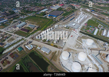 Oil refinery plant for primary and deep oil refining. Equipment and tanks in the oil refinery. Rectification and vacuum equipment Stock Photo